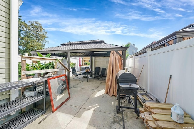 view of patio featuring a gazebo and grilling area