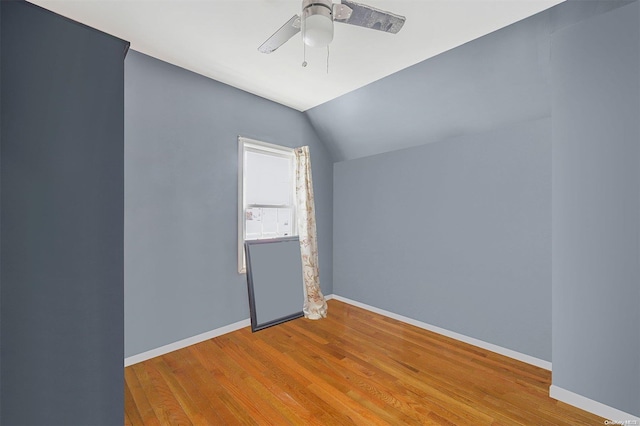 bonus room with ceiling fan, light hardwood / wood-style flooring, and lofted ceiling