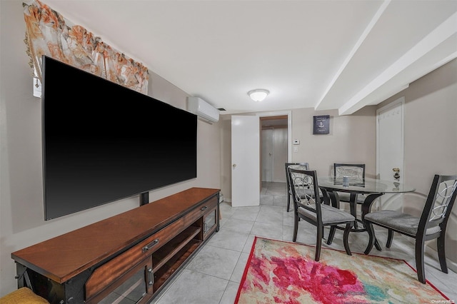 tiled dining room featuring a wall unit AC