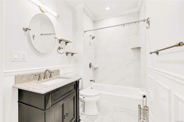 full bathroom featuring vanity, toilet, tiled shower / bath, and ornamental molding