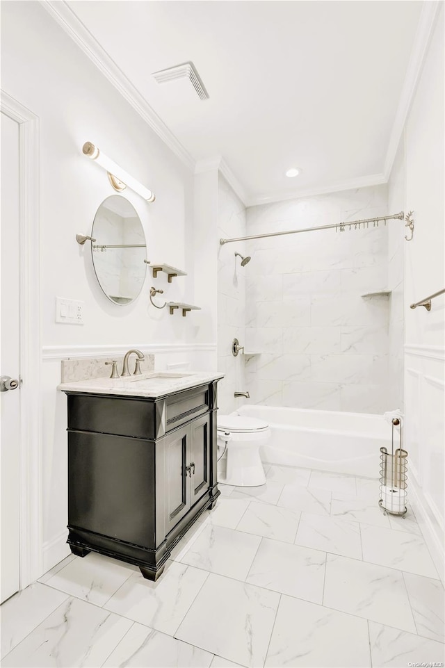 full bathroom featuring tiled shower / bath combo, toilet, ornamental molding, and vanity