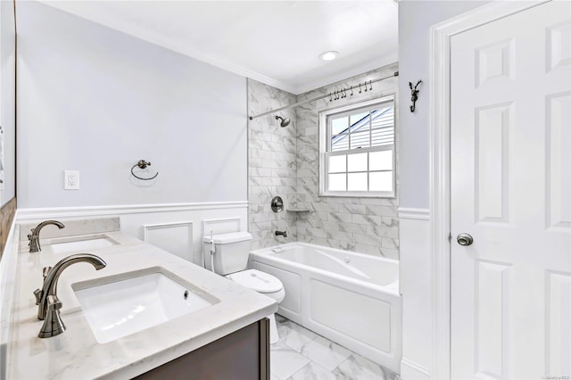 full bathroom featuring vanity, toilet, and tiled shower / bath