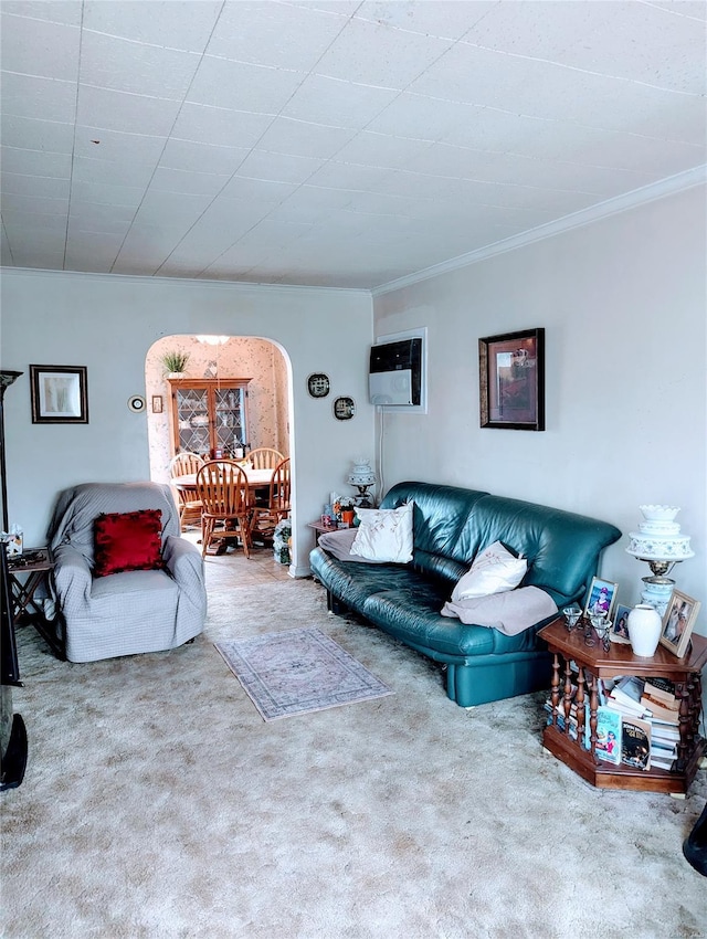 carpeted living room featuring crown molding