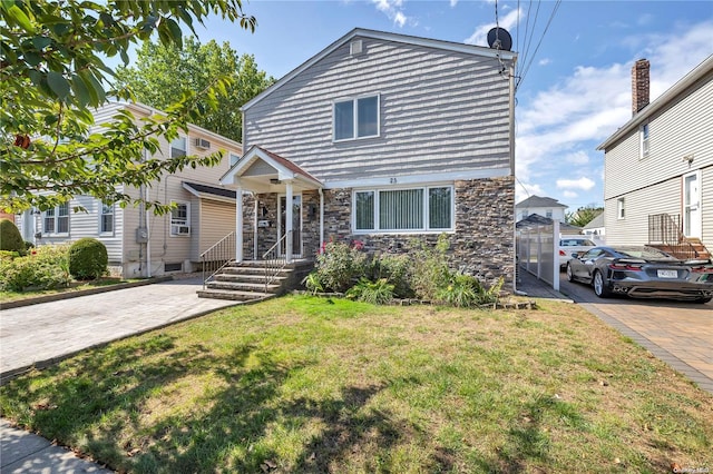 view of property featuring a front yard