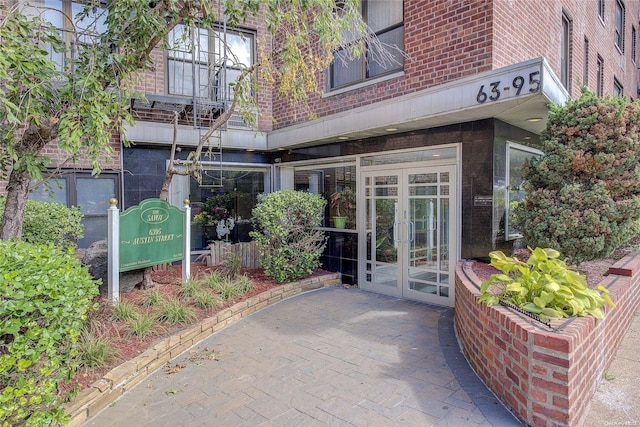 entrance to property featuring french doors