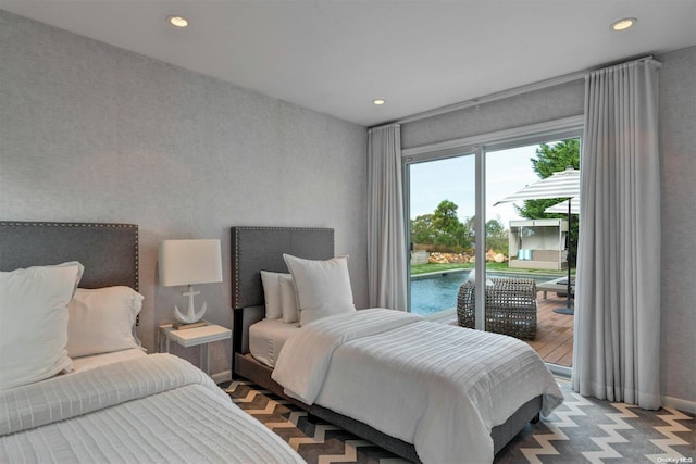 bedroom featuring access to exterior and wood-type flooring