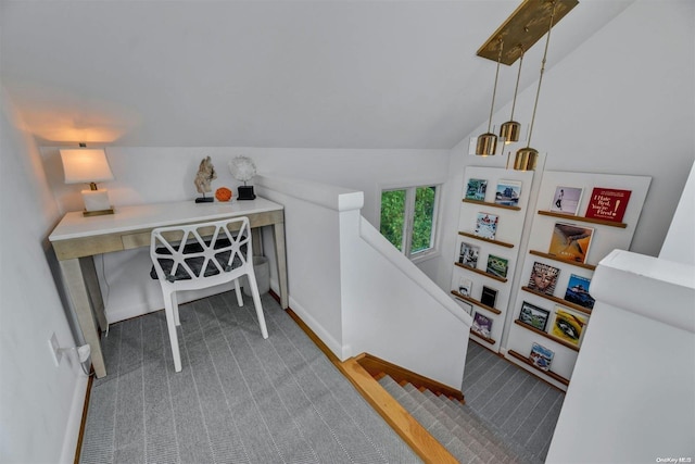 office with carpet and lofted ceiling