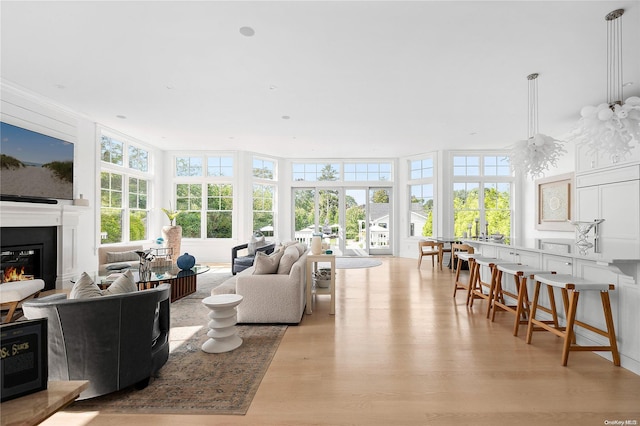 sunroom featuring a wealth of natural light