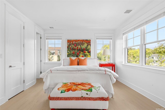 bedroom featuring light hardwood / wood-style flooring