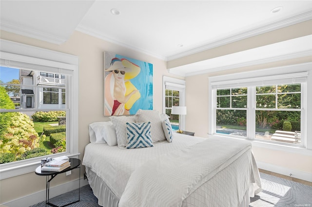 bedroom featuring crown molding