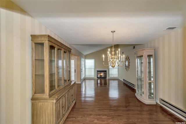 unfurnished dining area featuring an inviting chandelier, dark hardwood / wood-style flooring, lofted ceiling, and a baseboard radiator