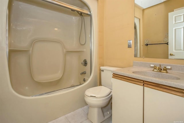 full bathroom with tile patterned floors, vanity, toilet, and shower / tub combination