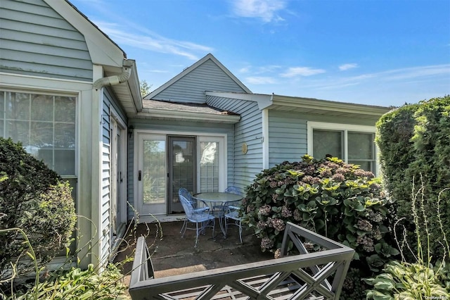 71 Standish Dr Unit 71, Mount Sinai, NY 11766 - property entrance with a patio