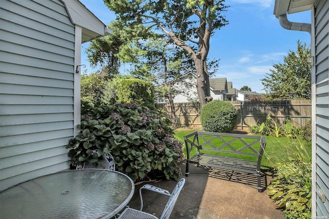 71 Standish Dr Unit 71, Mount Sinai, NY 11766 - balcony with outdoor dining area