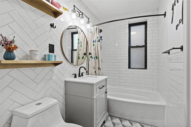 full bathroom with shower / bath combination with curtain, toilet, tile walls, and vanity