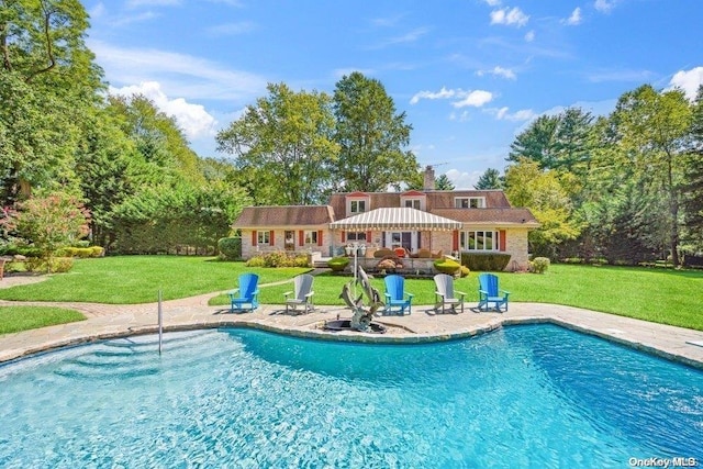 view of pool with a gazebo, a yard, and a patio