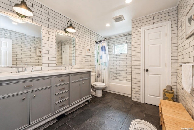 full bathroom with vanity, wood-type flooring, shower / tub combo, and toilet