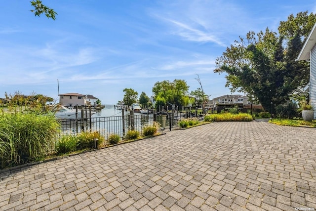 view of patio / terrace featuring a water view