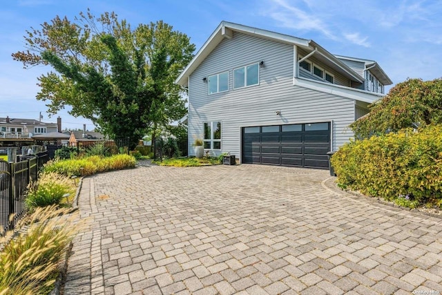 view of front of property with a garage