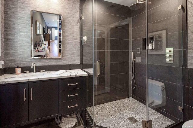 bathroom with vanity and an enclosed shower