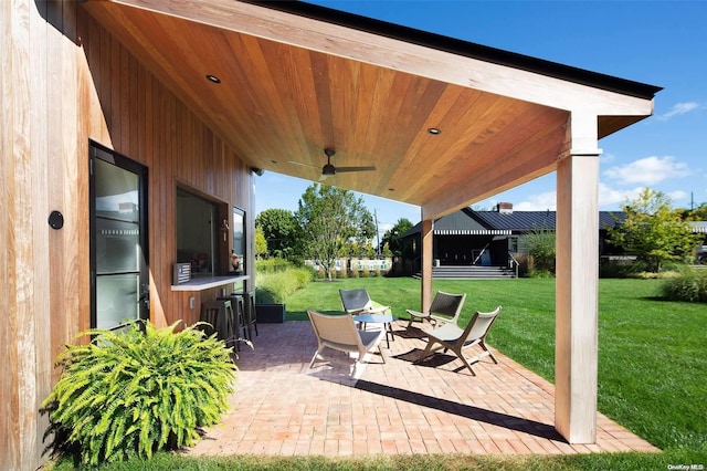 view of patio / terrace with ceiling fan