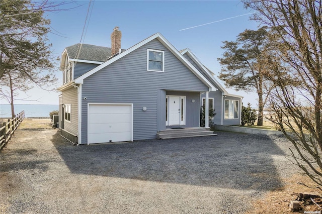 front facade with a garage