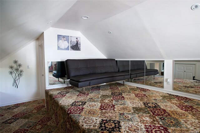 living room featuring carpet flooring and lofted ceiling