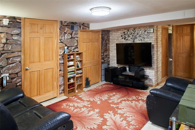 living room featuring a textured ceiling