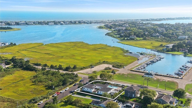 drone / aerial view with a water view