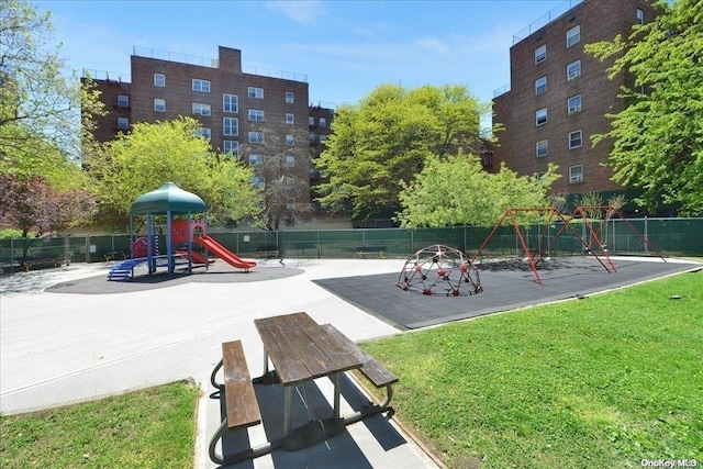 view of property's community with a playground