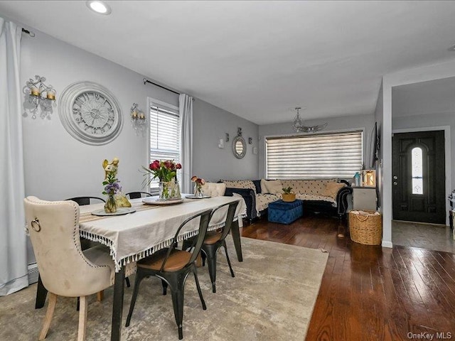 dining room with dark wood-type flooring