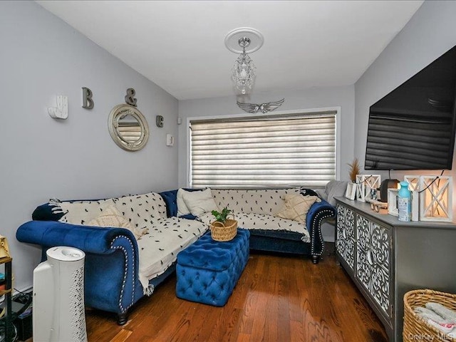 living room with dark hardwood / wood-style flooring