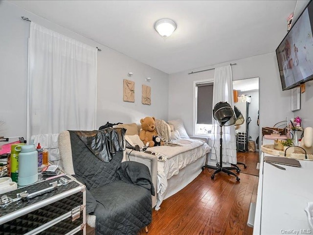 bedroom featuring wood-type flooring