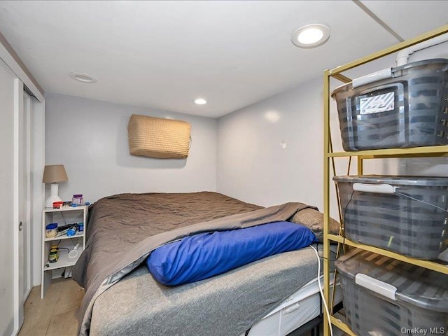 bedroom with hardwood / wood-style flooring