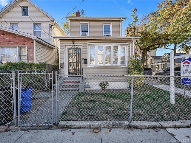 front facade with a front yard