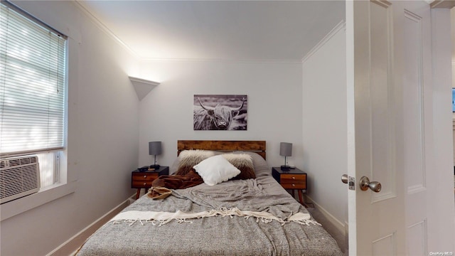 bedroom featuring crown molding