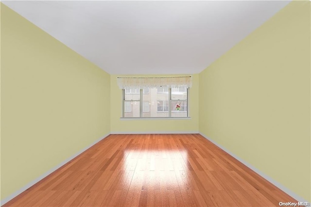 unfurnished room featuring light hardwood / wood-style flooring