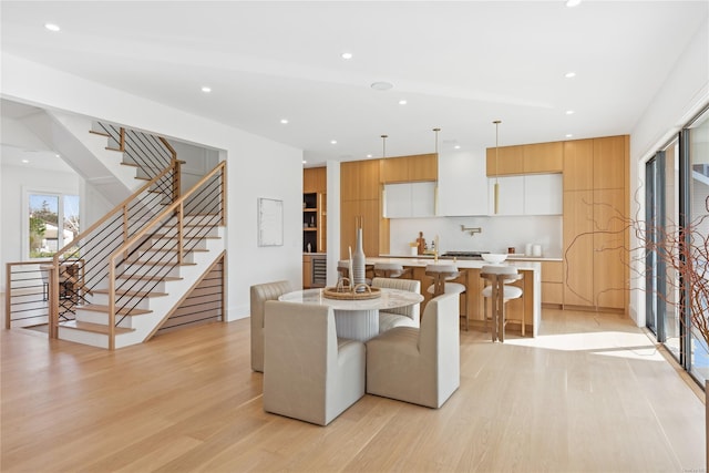 dining space featuring light hardwood / wood-style flooring