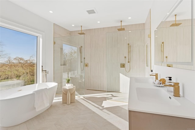 bathroom featuring vanity, radiator heating unit, and plus walk in shower