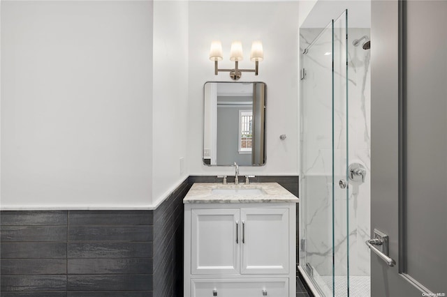 bathroom with vanity and an enclosed shower