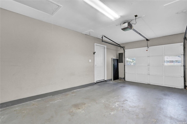 garage featuring electric panel and a garage door opener