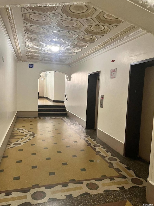 hallway featuring ornamental molding