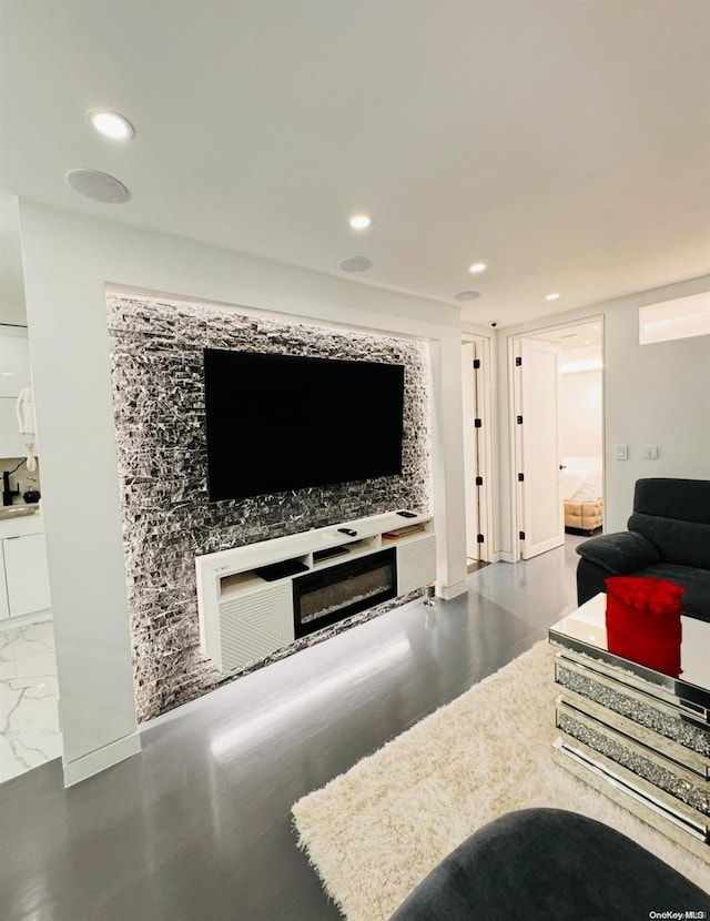 living room featuring a fireplace