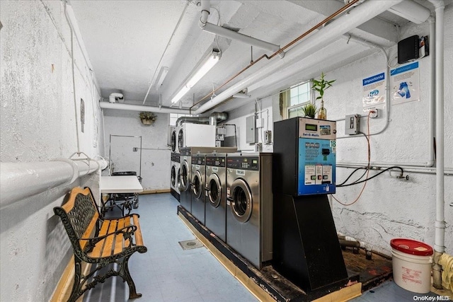 washroom with separate washer and dryer