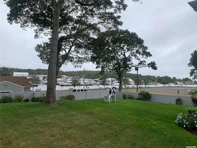 view of yard with a water view