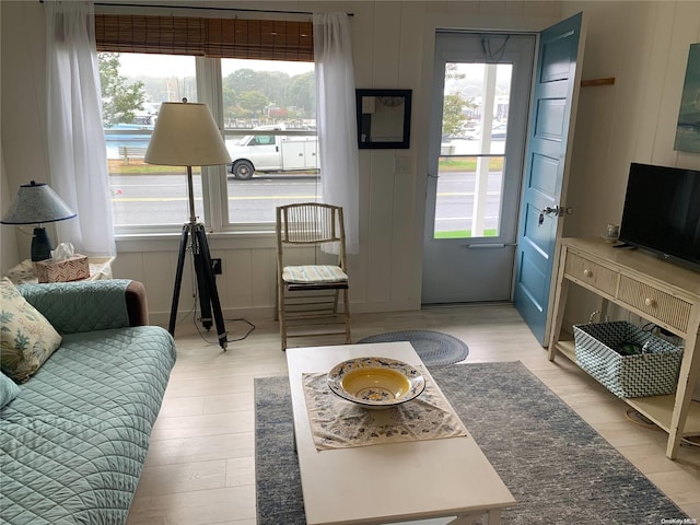 1 Canal Rd, Hampton Bays, NY 11946 - living area with healthy amount of natural light and light wood-type flooring