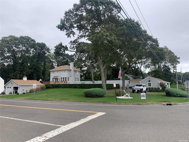 view of front facade with a front lawn