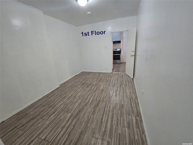 empty room featuring hardwood / wood-style flooring