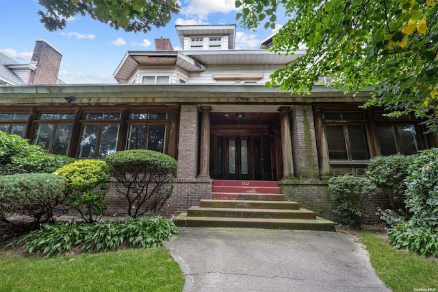 view of exterior entry with french doors