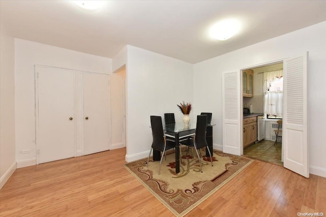 dining room with light hardwood / wood-style flooring